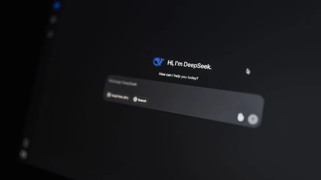 A dark-mode payments dashboard framed on a desk at dusk.